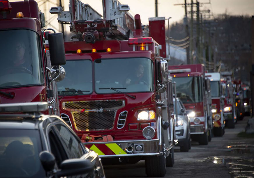 Fire trucks line up to thank the medical community