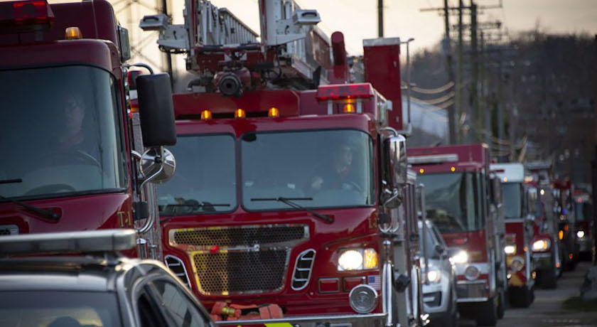 Fire trucks line up to thank the medical community